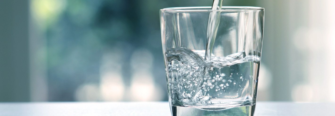 Water pouring into a glass